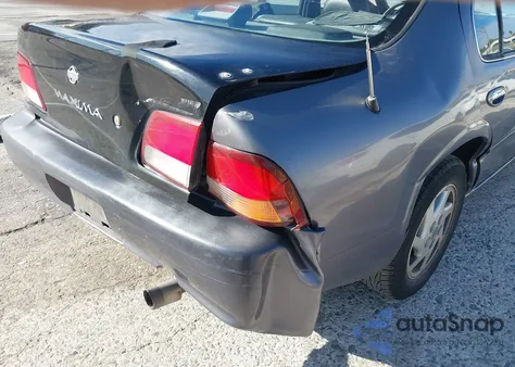 1997 Nissan Maxima Gle/Gxe/Se z USA, uszkodzony, nr VIN JN1CA21D9VT822506